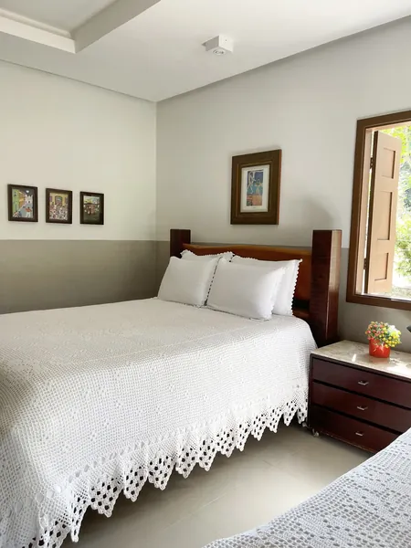 Apartamento Assum Preto e João de Barro, com cama de casal e criado-mudo
