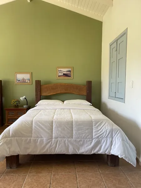 Apartamento Prata Quero-Quero, com parede verde